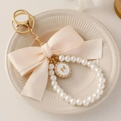 Pearl Keychain with Bow & Angel Charm
