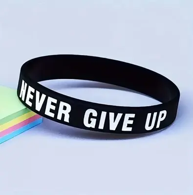 “Never Give Up” Motivational Sports Wristband